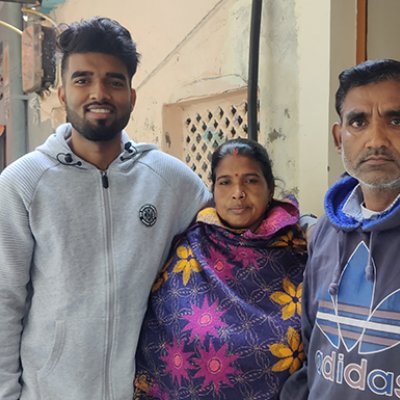 Amritesh Kumar Maurya with his parents